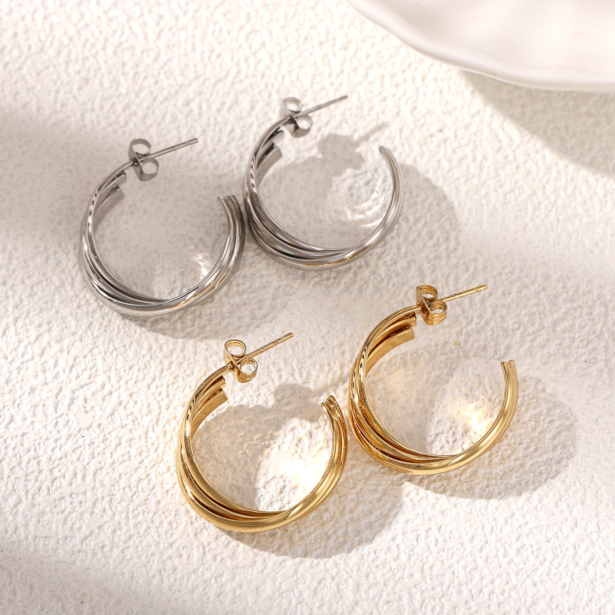 The trinity twist Hoops